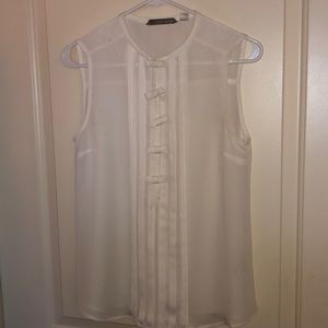 Cream colored button down blouse